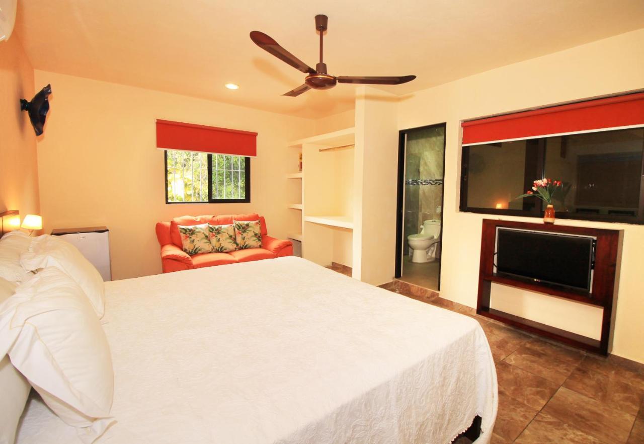 Papagayo Hotel Boutique 신데 델 카르멘 외부 사진 A bedroom at the hotel