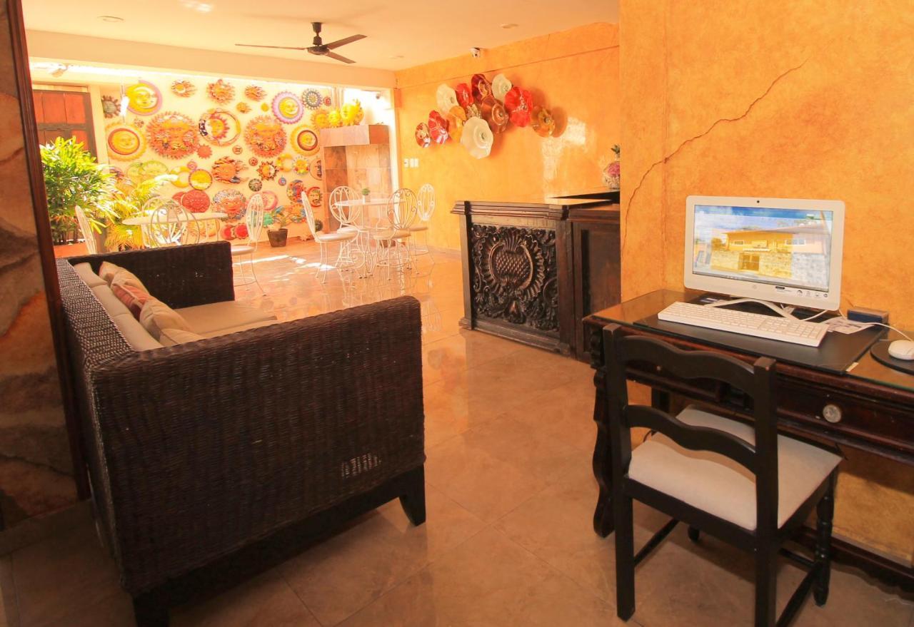Papagayo Hotel Boutique 신데 델 카르멘 외부 사진 The interior of a typical hotel room