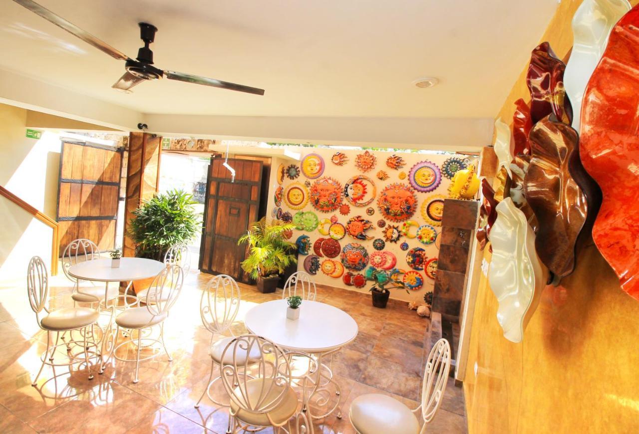 Papagayo Hotel Boutique 신데 델 카르멘 외부 사진 The interior of the gallery