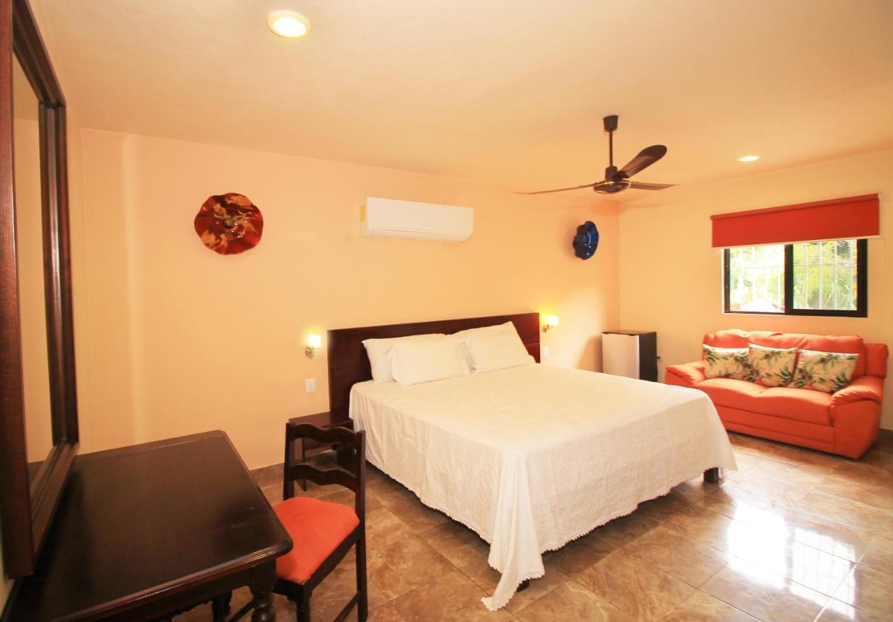 Papagayo Hotel Boutique 신데 델 카르멘 외부 사진 A bedroom at the hotel